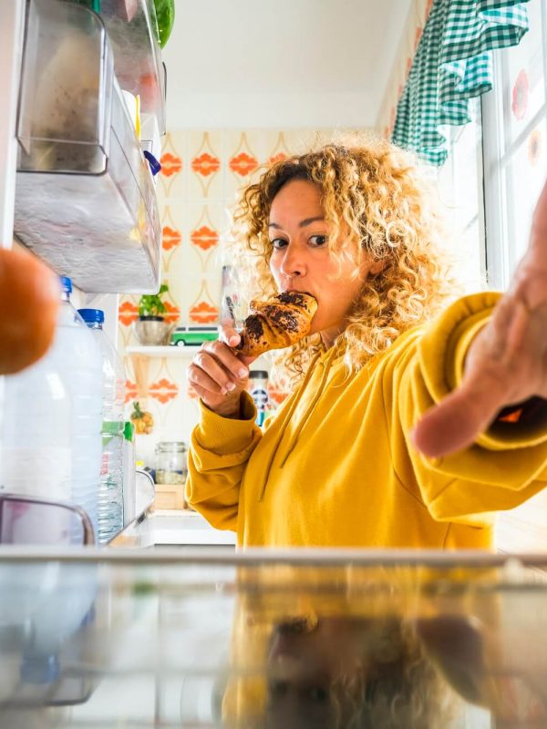 hungry-beautiful-adult-young-woman-opening-the-fridge-1.jpg